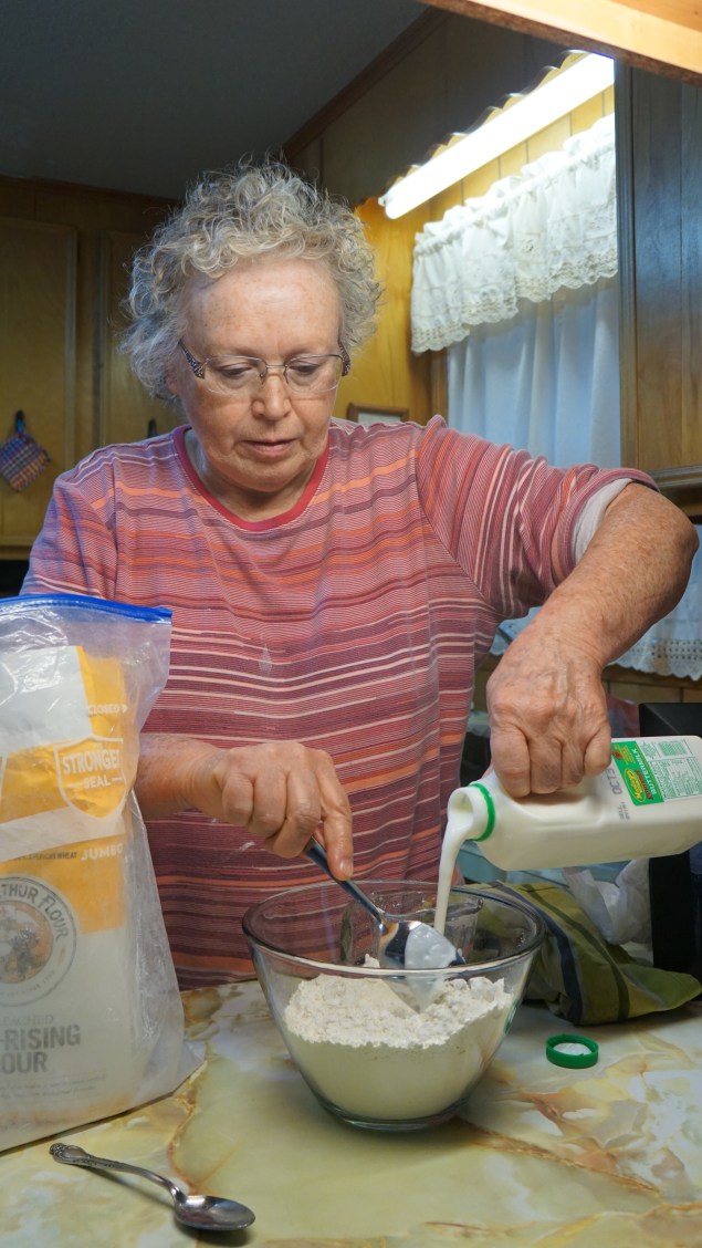 Pouring in Buttermilk. Mama doesn't measure